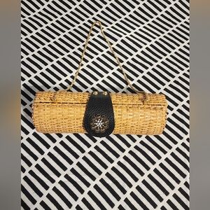 Rattan and leather clutch